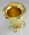 Gold vase finished with second vine